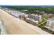 Aerial perspective of beachfront property and surrounding area at 4139 S Atlantic Ave # B103, New Smyrna Beach, FL 32169