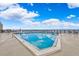 Refreshing rooftop pool with ocean view reflections at 4139 S Atlantic Ave # B103, New Smyrna Beach, FL 32169