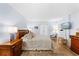 Relaxing main bedroom with king-size bed and access to balcony at 4139 S Atlantic Ave # B103, New Smyrna Beach, FL 32169