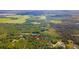 Aerial view of property lines and home situated in a wooded area at 4660 Holly Rd, New Smyrna Beach, FL 32168