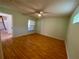 Spacious bedroom with light walls, hardwood flooring and a window at 101 Braeburn Cir, Daytona Beach, FL 32114