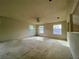 Bright and airy bedroom with ceiling fan and carpet flooring at 101 Braeburn Cir, Daytona Beach, FL 32114