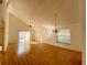 Bright living room featuring hardwood floors, a ceiling fan, and chandelier at 101 Braeburn Cir, Daytona Beach, FL 32114