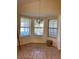 Bright dining area with bay window and tiled floors at 101 Braeburn Cir, Daytona Beach, FL 32114