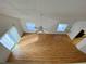 Open living area with laminate wood flooring and lots of natural light at 101 Braeburn Cir, Daytona Beach, FL 32114