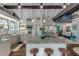 Bright kitchen featuring a large island, stainless steel appliances, and hardwood floors at 412 S Peninsula Ave, New Smyrna Beach, FL 32169