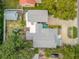 Overhead view of house, yard, and driveway at 412 S Peninsula Ave, New Smyrna Beach, FL 32169