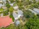 Aerial view showing house and surrounding homes at 412 S Peninsula Ave, New Smyrna Beach, FL 32169