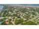 Aerial view of home, beach, and neighborhood at 412 S Peninsula Ave, New Smyrna Beach, FL 32169