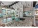 Spacious kitchen with granite countertops, modern appliances, and an island at 412 S Peninsula Ave, New Smyrna Beach, FL 32169
