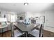 Open concept dining area with kitchen and living room view at 3509 S Atlantic Ave # 209, New Smyrna Beach, FL 32169