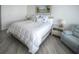 Bright bedroom with king bed and calming decor at 241 Riverside Dr # 510, Holly Hill, FL 32117