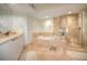 Elegant bathroom with soaking tub, walk-in shower, and double vanity at 241 Riverside Dr # 510, Holly Hill, FL 32117