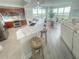 Modern kitchen with breakfast bar and stainless steel appliances at 241 Riverside Dr # 510, Holly Hill, FL 32117