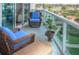 Relaxing balcony with wicker furniture and a view at 241 Riverside Dr # 510, Holly Hill, FL 32117