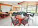 Relax in the comfortable lounge area with a fireplace and large screen TV at 241 Riverside Dr # 510, Holly Hill, FL 32117