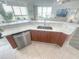 Modern kitchen with stainless steel appliances and island seating at 241 Riverside Dr # 510, Holly Hill, FL 32117
