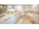 Spa-like bathroom with double vanity and soaking tub at 241 Riverside Dr # 510, Holly Hill, FL 32117