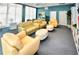 Relax and unwind in the community reading room with comfortable seating and bookshelves at 241 Riverside Dr # 510, Holly Hill, FL 32117