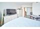 Spacious bedroom with a queen-size bed and ample storage at 241 Riverside Dr # 510, Holly Hill, FL 32117