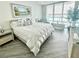 Spacious bedroom with king-size bed and water views at 241 Riverside Dr # 510, Holly Hill, FL 32117