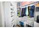 Large walk-in closet with ample shelving and hanging space at 241 Riverside Dr # 510, Holly Hill, FL 32117