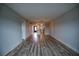 Open living area with kitchen view and wood-look floors at 101 N Riverside Dr # 4140, New Smyrna Beach, FL 32168
