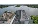 Aerial view of building showcasing rooftop and parking at 101 N Riverside Dr # 4140, New Smyrna Beach, FL 32168
