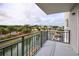 Balcony view of canal, landscaping, and boats at 101 N Riverside Dr # 4140, New Smyrna Beach, FL 32168