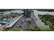 Aerial view of waterfront community, featuring parking, boat slips, and a pool at 101 N Riverside Dr # 4140, New Smyrna Beach, FL 32168