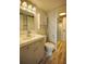 Updated bathroom with vanity, toilet and walk-in shower at 101 N Riverside Dr # 4140, New Smyrna Beach, FL 32168
