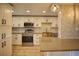 Modern kitchen with stainless steel appliances and island at 101 N Riverside Dr # 4140, New Smyrna Beach, FL 32168