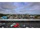 Boats at the marina with parking area in the foreground at 101 N Riverside Dr # 4140, New Smyrna Beach, FL 32168
