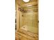 Large walk-in shower with marble tile and glass door at 101 N Riverside Dr # 4140, New Smyrna Beach, FL 32168