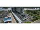 Aerial view of waterfront building with parking at 101 N Riverside Dr # 4140, New Smyrna Beach, FL 32168