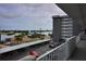 Balcony overlooks marina, parking, and waterfront at 101 N Riverside Dr # 4140, New Smyrna Beach, FL 32168