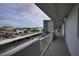 View from condo hallway showing parking and marina views at 101 N Riverside Dr # 4140, New Smyrna Beach, FL 32168