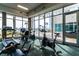 Fitness center with cardio equipment and scenic waterfront views at 241 Riverside Dr # 2007, Holly Hill, FL 32117
