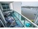 Balcony with outdoor seating and stunning water views at 241 Riverside Dr # 2007, Holly Hill, FL 32117
