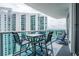 Balcony with seating area and partial water view at 241 Riverside Dr # 2007, Holly Hill, FL 32117