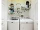 Laundry room with Maytag washer and dryer at 1805 Turnbull Lakes Dr, New Smyrna Beach, FL 32168