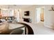 Open living space showcasing a TV, comfy seating, and hallway to bedroom at 1805 Turnbull Lakes Dr, New Smyrna Beach, FL 32168