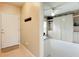 Entryway with coat hooks and a view into a well-organized bedroom at 1805 Turnbull Lakes Dr, New Smyrna Beach, FL 32168