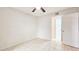 Bedroom with tile floors and ceiling fan at 1600 Big Tree Rd # D2, South Daytona, FL 32119