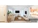 Virtually staged living room with light beige couch and rug at 1600 Big Tree Rd # D2, South Daytona, FL 32119