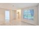 Living room featuring tile floors and a window with blinds at 1600 Big Tree Rd # D2, South Daytona, FL 32119