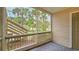 Screened porch overlooking backyard and stairs at 1600 Big Tree Rd # D2, South Daytona, FL 32119