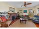 Spacious living room with hardwood floors, fireplace, and comfy seating at 1206 S Riverside Dr, New Smyrna Beach, FL 32168