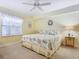 Bright bedroom with king-size bed and coastal decor at 426 Bouchelle Dr # 303, New Smyrna Beach, FL 32169