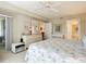 King bedroom with dresser and access to bathroom at 426 Bouchelle Dr # 303, New Smyrna Beach, FL 32169